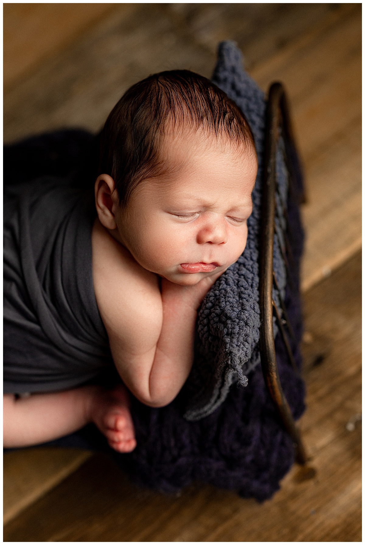 Baby cuddle onto blanket for Norma Fayak Photography