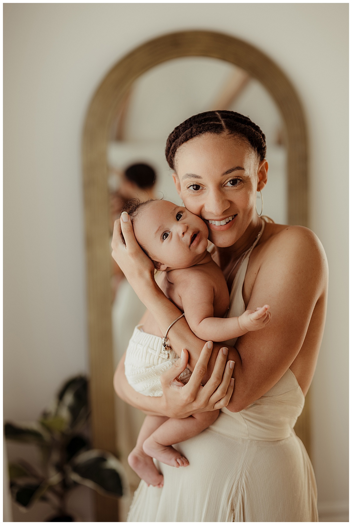 Mom holds little baby for Virginia Newborn Photographer