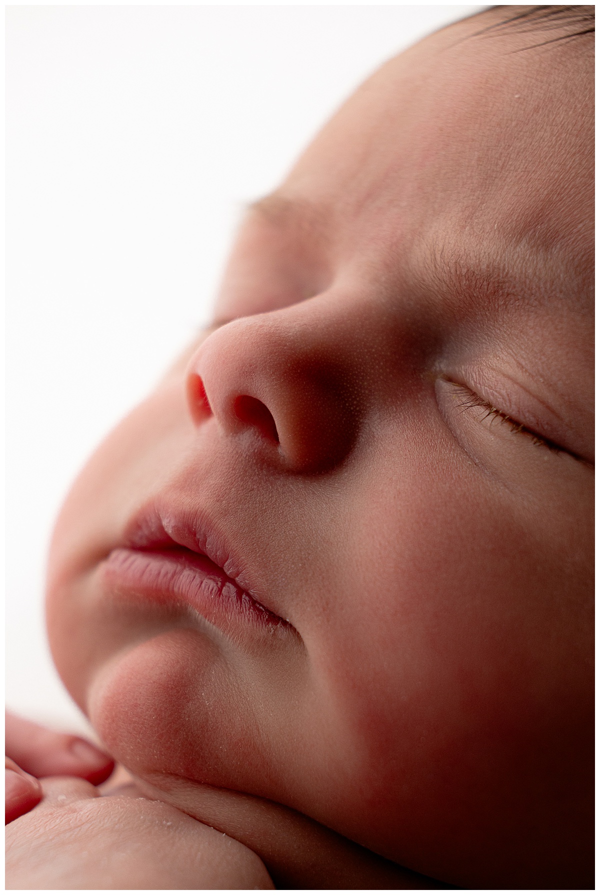 Tiny baby facial features using my must-have Gear for Newborn Photography