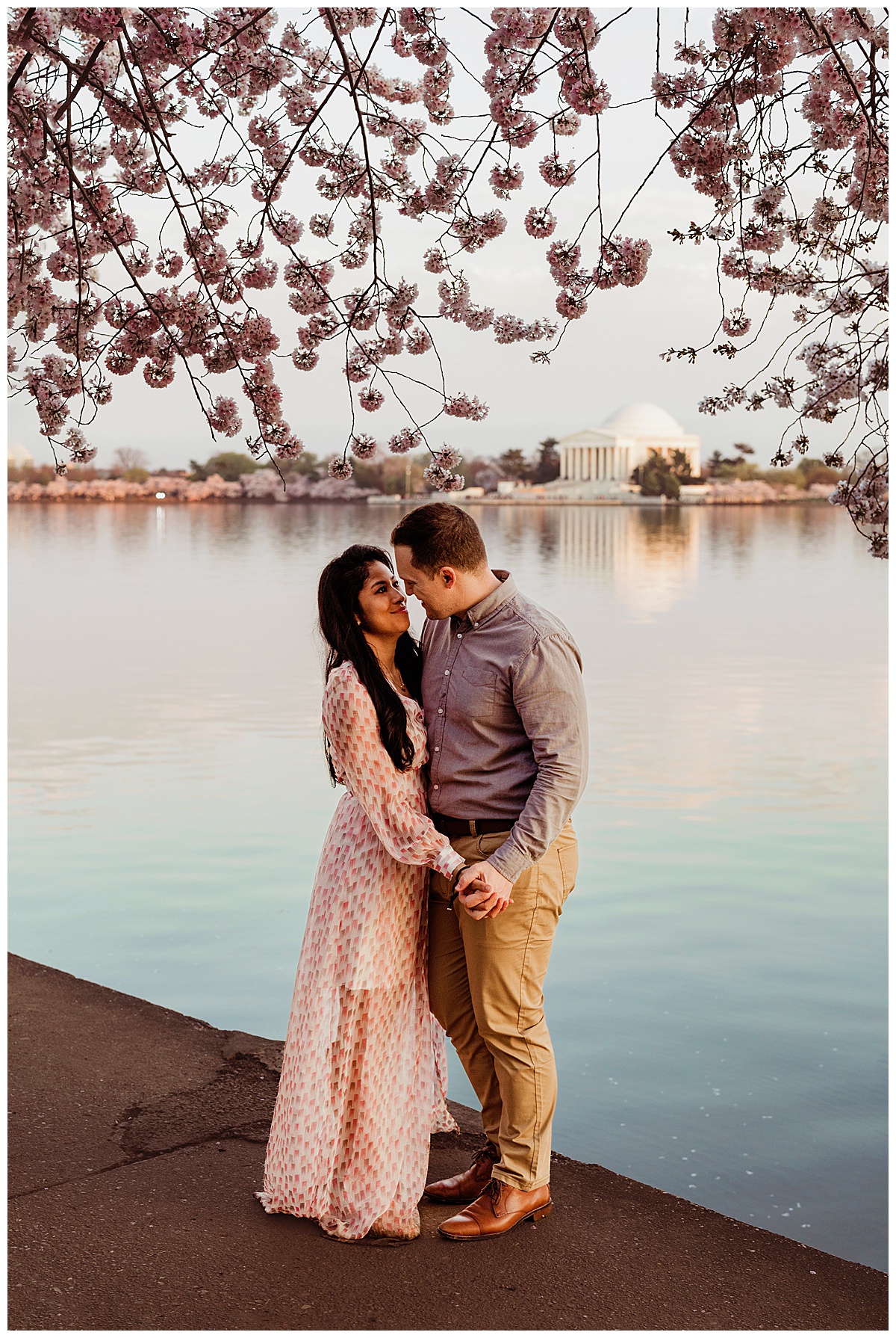 Mom and dad share a kiss during their Washington, DC, Cherry Blossom photos