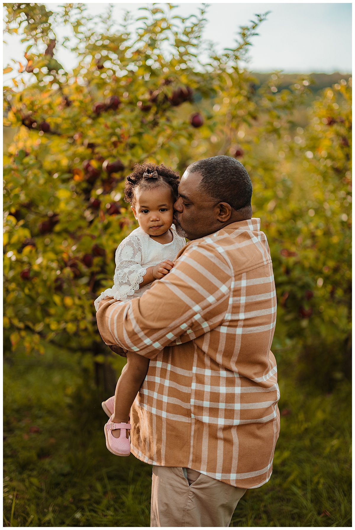 Dad holds young girl for Virginia Family Photographer 