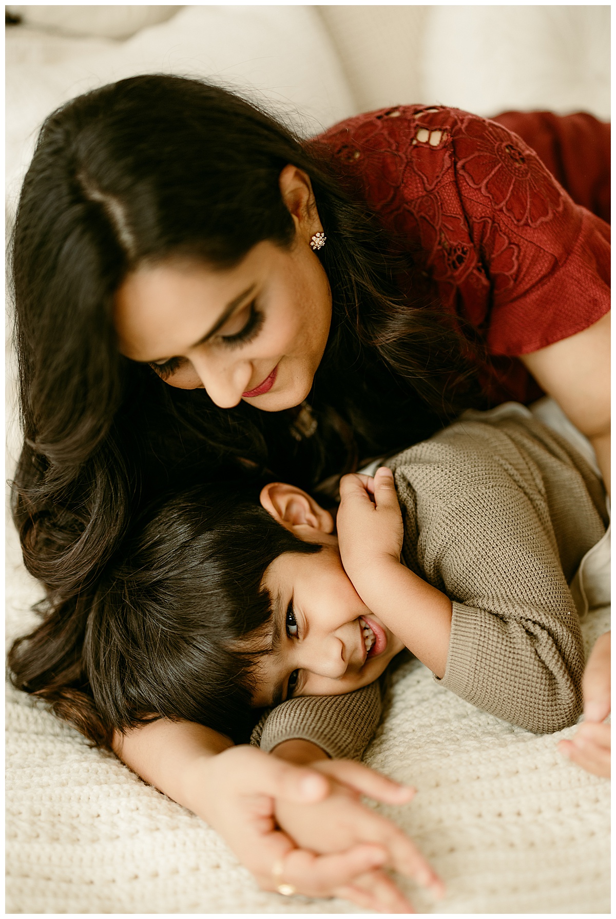 Mom cuddles with young son during their Unposed Lifestyle Shoot
