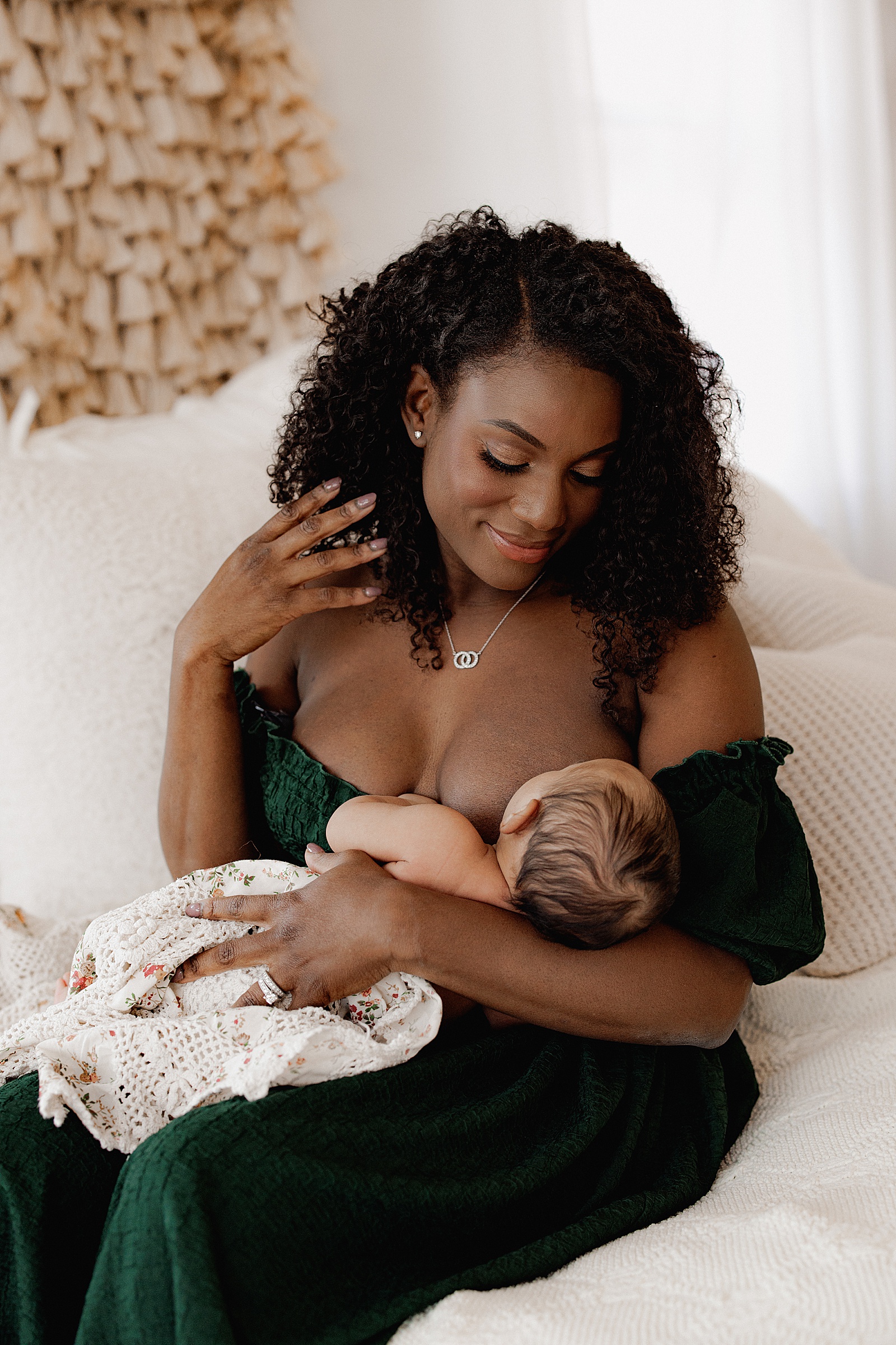 Mom smiles at baby for Virginia Newborn Photographer