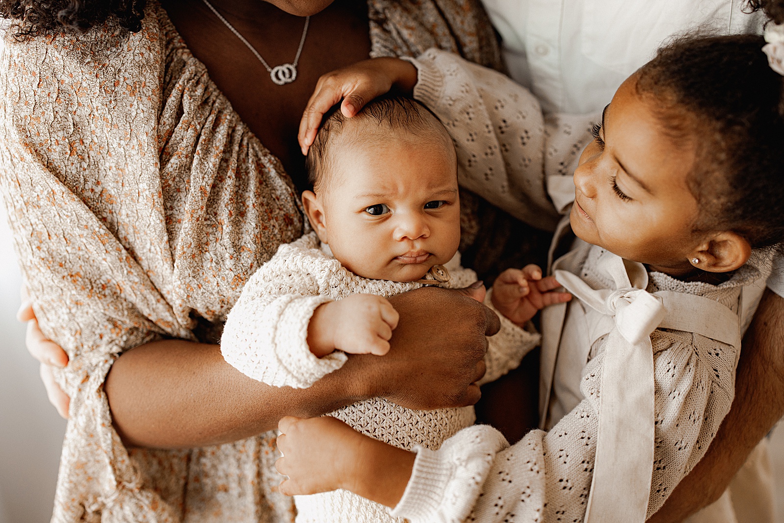 Mom cuddles kids close for Virginia Newborn Photographer