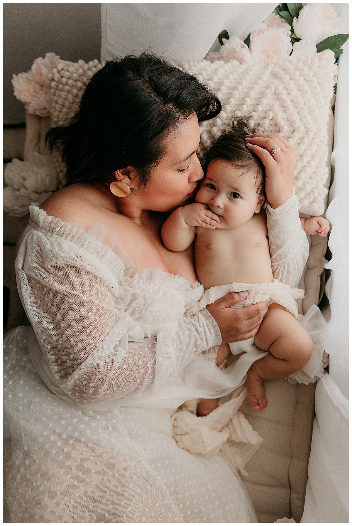 Mom cuddles baby for Norma Fayak Photography