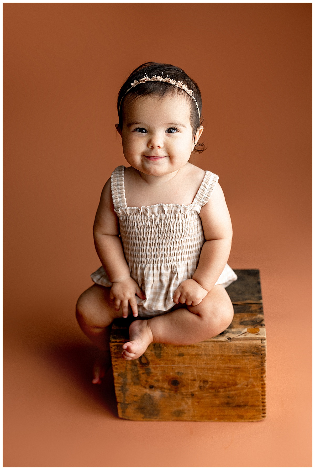 Little girls sits on wood box for Virginia Baby Photographer